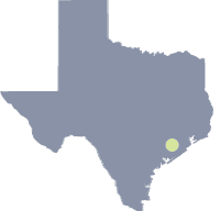 Map of Texas that shows location of Freeport over background of a close-up map of the port.