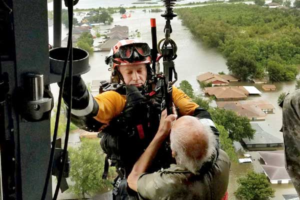Texas Task Force 1 helicopter rescues flood victims after Harvey